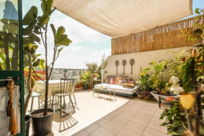 Spacious 2BR w/ Beautiful Balcony Terrace in the Vibrant Heart of Tel Aviv